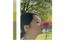 李沁分享春日美照 垂眸浅嗅花香尽显迷人侧颜图片