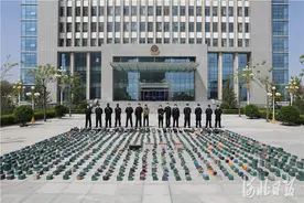 探访｜人防+技防 给电动自行车装上安全锁图片