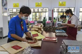返乡创业记——仫佬族女企业家发展电商助力群众脱贫致富图片