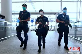 香港机场特警首位女主管：警务工作是放大后的篮球运动图片
