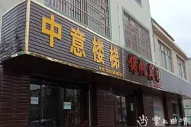 马龙龙翔西路35家门店招牌提质改造完成图片