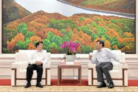 王文涛会见国家开发银行行长欧阳卫民图片