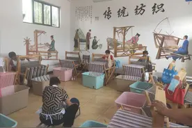 这个村里又有了织布机图片