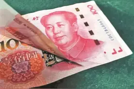 针孔摄像头藏身人民币中图片