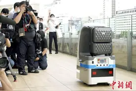 日本打造“未来车站”消毒、送餐机器人将上岗(图)图片
