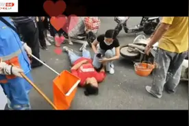 视频｜女子被撞，民警调取监控“意外”发现：“白衣天使”跪地救人后默默离开图片