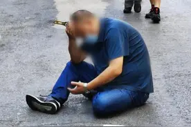 扳手从天而降，直插男子头顶！真是飞来横祸……图片