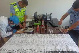 罚单铺满一桌子！金华电动车闯红灯排第一，这位外卖小哥可真能啊图片