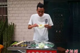 万物皆可“卷”！农村小伙卷花式棉花糖走红图片