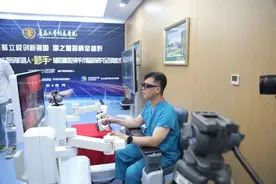 这是世界首例！青岛医生通过5G+国产机器人为贵州病人完成超远程手术图片