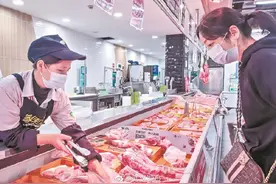 武汉猪肉价格半年降了三成图片