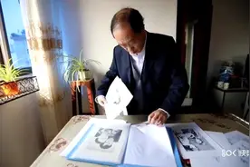 “草根画家”朱学峰的幸福小康路图片