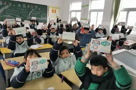 明光市实验小学新时代文明实践“小手拉大手 家校共建”活动图片