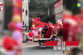 湖南返乡大学生新娘用插秧机当婚车，收割机车队紧随其后 网友：够拉风图片