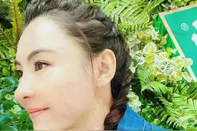 张柏芝牛年扎“牛”角辫 秀精致侧颜五官立体图片