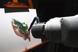 研究团队创造新型机器人 可以按需作画图片