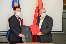 中国和多米尼加签署经济技术合作协定图片