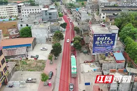 江华：207国道长下坡路段改造升级 运用新材料降低安全隐患图片