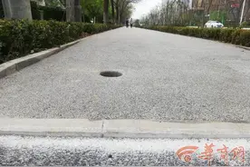 西安锦业路新修路有小台阶 市民称骑车太“颠簸”图片