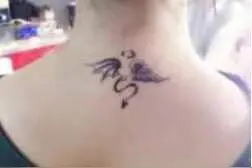 莫让文身成青少年身心“疤痕”图片