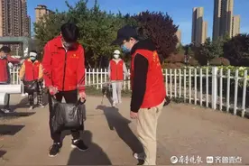 菏泽学院数学与统计学院赴牡丹园开展志愿服务活动图片