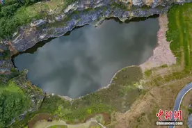 探访重庆南山闭矿区 昔日矿坑变身绿色公园图片