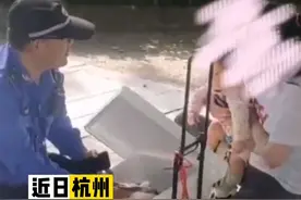 女子抱娃在西湖边卖饮料，城管把饮料全“收”走，却赢得一片点赞图片