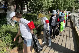 昆明双龙桥社区：开展“双报到”“保护母亲河”主题活动图片