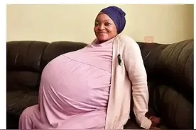 十胞胎！一女子生下3女7男图片