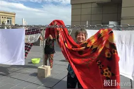 赞！晾衣杆统一搬新家，居民回家不用担心被砸图片