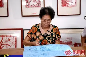 国家级非遗传承人陈秋日：一把剪刀一张纸中鉴往知来图片