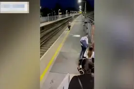 英国一醉酒男子跳下铁轨 被进站列车从身旁驶过安然无恙图片