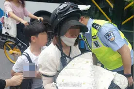 上海今起骑乘电瓶车不带头盔罚30图片