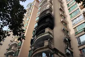 广州一小区5楼起火，邻楼保安隔空喷水扑救图片