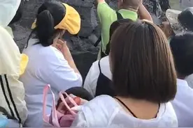 官方回应男子在贵州梵净山石壁刻字：若属实，依法处理图片