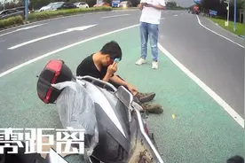 嫌天热不带头盔，电动车车主遭一吨重的橡胶皮“打脸”图片