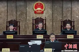 广西中医药大学原校长唐农受审：被控受贿1598万余元图片