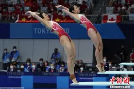 中国跳水东京奥运开门红 施廷懋王涵女双3米板夺冠图片