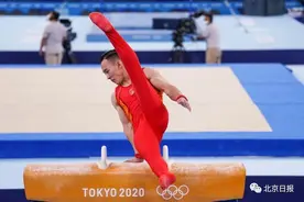 中国男子体操队获得铜牌！队员肖若腾，是北京小伙儿图片