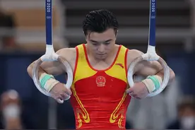 体操——刘洋夺得男子吊环冠军图片