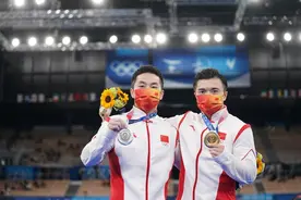 中国队包揽男子吊环冠亚军 江苏小伙尤浩摘银图片