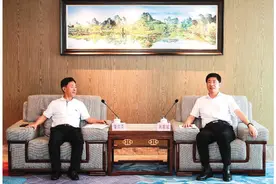 周家斌会见中国东信董事长鲁东亮图片