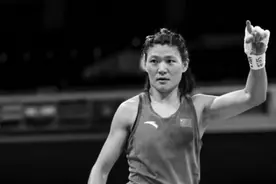 先练散打后练拳击“女汉子”谷红要争“首金”图片