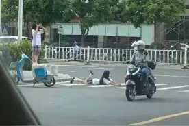 河源趴在斑马线上拍照的两女孩已接受批评教育！称系模仿网红图片