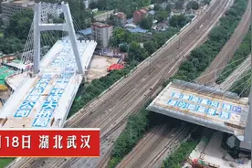 武汉跨京广铁路高架桥转体“牵手成功”，白沙洲到南湖仅需5分钟图片