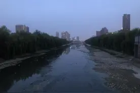 郑州新一轮强降雨来袭 大河网记者实地记录东风渠水位变化图片
