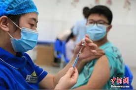 新加坡媒体：中国超10亿人完成新冠疫苗接种图片