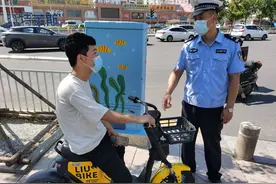 全面清理不配备头盔共享单车 烟台严查骑行者不佩戴头盔图片