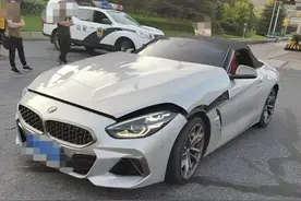 高速上突然滚来一只轮胎，宝马跑车被砸懵！车主心疼坏了：新车啊，上牌才三天图片