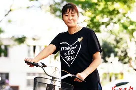 福利院长大的武汉“铁妈妈”，把儿子培养成博士后图片